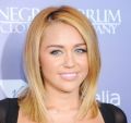 Por que Miley Cyrus cortou o cabelo?